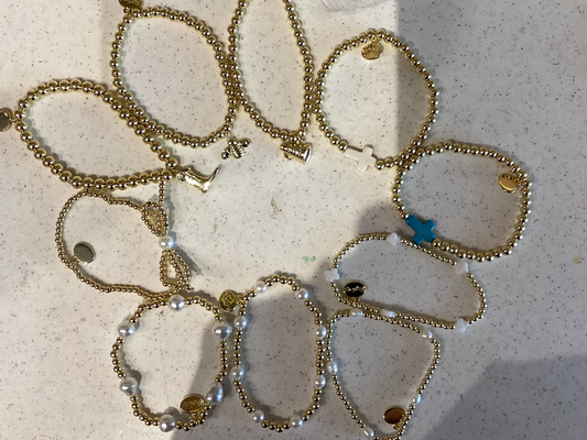 Alex Carol Pearl, Charm, Cross